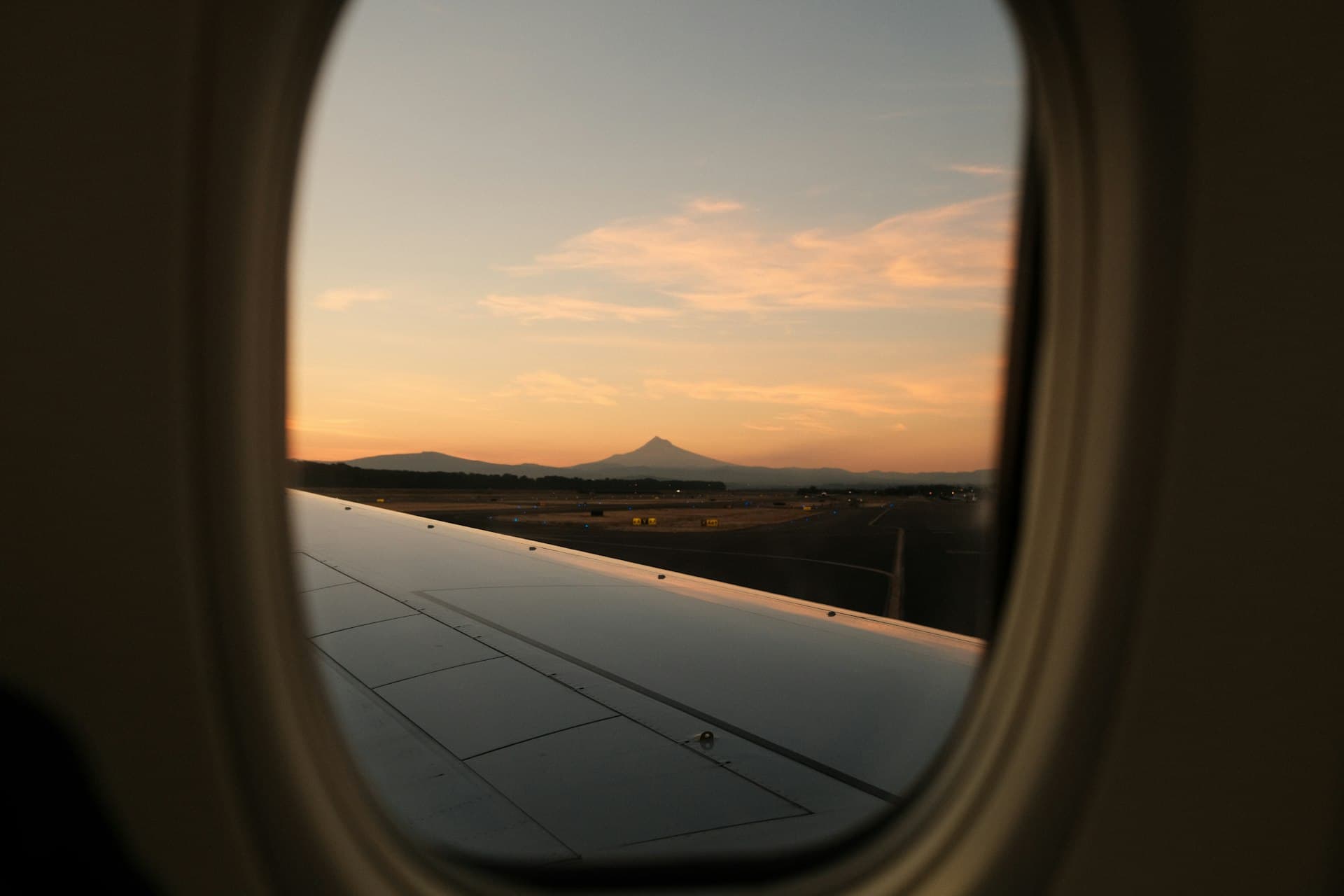 Mountain landscape seen through an airplane window